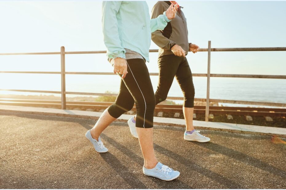 Person drinking water before a walk on a warm afternoon
